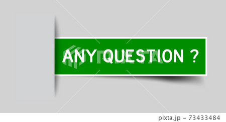 Inserted green color label sticker with word any question on gray background 73433484