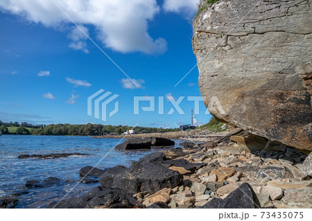 Stones close to the pier in Bruckless in County Donegal - Ireland. Stones close to the pier in Bruckless in County Donegal - Ireland. 73435075