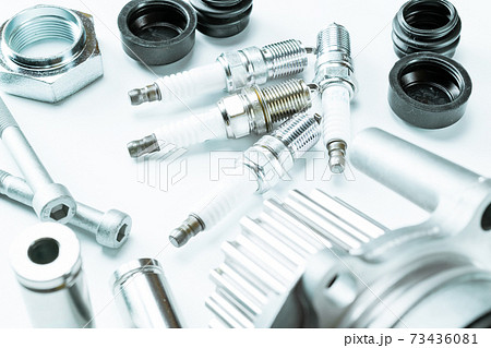 Spare parts. Auto motor mechanic spare or automotive piece on white background. Set of new metal car part. Automobile engine service. 73436081