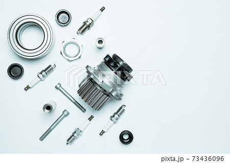automotive parts. Set of new metal car part. Auto motor mechanic spare or automotive piece isolated on white background. Technology of mechanical gear with space for text. 73436096