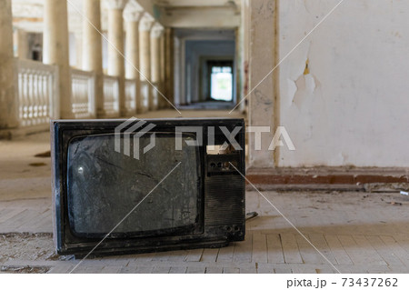 Broken television set in the interior of abandoned building of the Soviet sanatorium Georgia in Gagra, Abkhazia Broken television set in the interior of abandoned building of the Soviet sanatorium Georgia in Gagra, Abkhazia 73437262