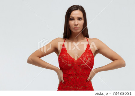 Sexy woman in lace bodysuit in studio 73438051