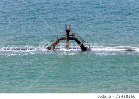 Saint-Malo. City embankment at high tide. 73438366