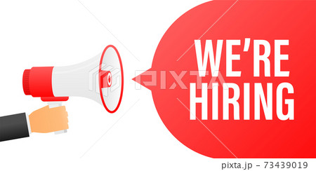 Hand holding megaphone with We're hiring. 73439019