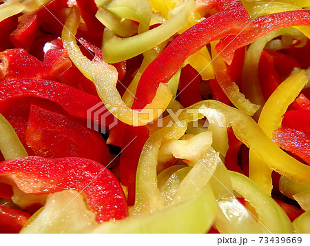 Sliced fresh colored peppers 73439669