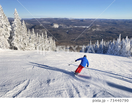Skier in Mont Tremblant summit, Quebec, Canada Skier in Mont Tremblant summit, Quebec, Canada 73440790