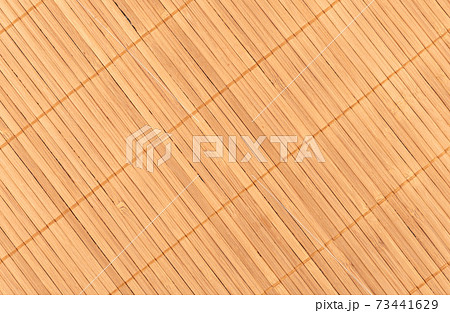 Full frame close-up shot of a bamboo food mat diagonal. Full frame close-up shot of a bamboo food mat diagonal. 73441629