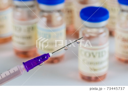 Vaccine to fight the of Covid-19 Coronavirus SARS-CoV-2 in bottle sterile vial and syringe Vaccine to fight the of Covid-19 Coronavirus SARS-CoV-2 in bottle sterile vial and syringe 73445737
