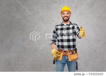 happy male worker or builder showing thumbs up happy male worker or builder showing thumbs up 73450305