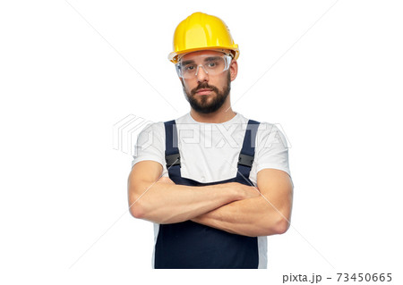male worker or builder with crossed arms 73450665