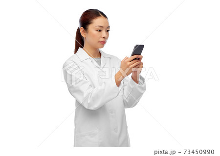 asian female doctor or nurse with smartphone asian female doctor or nurse with smartphone 73450990