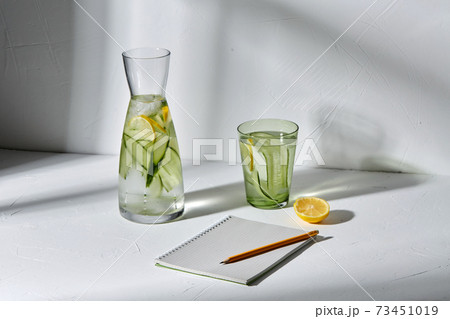 water with lemon and cucumber and notebook water with lemon and cucumber and notebook 73451019
