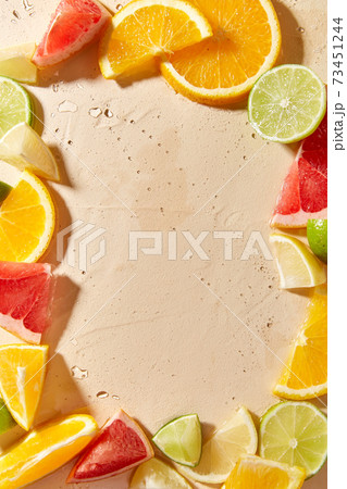 frame of slices of different citrus fruits frame of slices of different citrus fruits 73451244