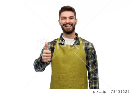 happy male gardener or farmer showing thumbs up happy male gardener or farmer showing thumbs up 73451522
