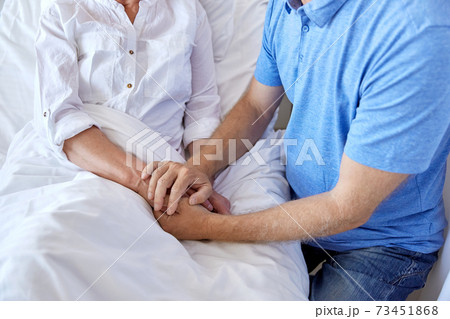 senior couple meeting at hospital ward 73451868