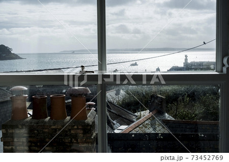 View across the ocean from a Cornish Seaside cottage. 73452769