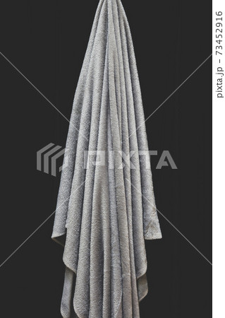 Close up of draped grey velvet fabric, focus on folds and creases 73452916