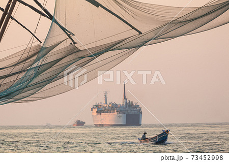 Fishing boat and Chinese Fishing nets, Fort Kochi, Cochin 73452998
