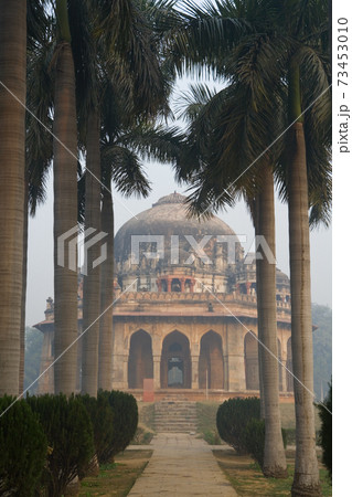 View of trees leading to the Muhammad Shah Sayyid tomb in the famous Lodhi Garden in New Delhi, India 73453010