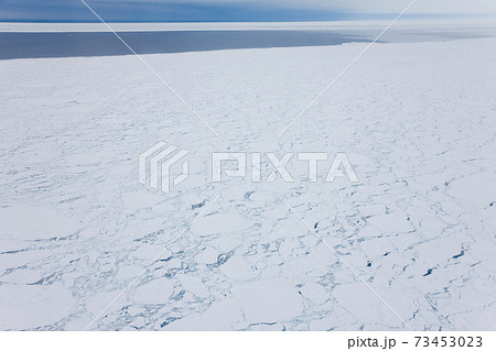 Aeriel view over sea ice, near Kulusuk, Greenland 73453023