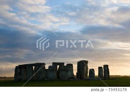 Sunset at Stonehenge, a prehistoric monument in Wiltshire, England 73453170