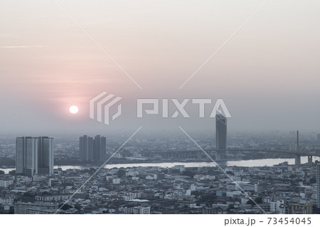 Aerial view of Amazing beautiful scenery view of Bangkok City skyline and skyscraper before sun setting. 73454045