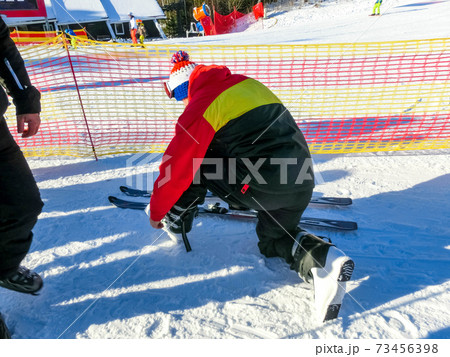 People resting at Tatranska Lomnica, the popular ski resort in High Tatras People resting at Tatranska Lomnica, the popular ski resort in High Tatras 73456398