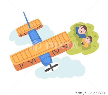 Father and his Son Launching Airplane Model, View from Above of Happy Parent and Child Spending Time Together Outdoors Cartoon Style Vector Illustration 73456754