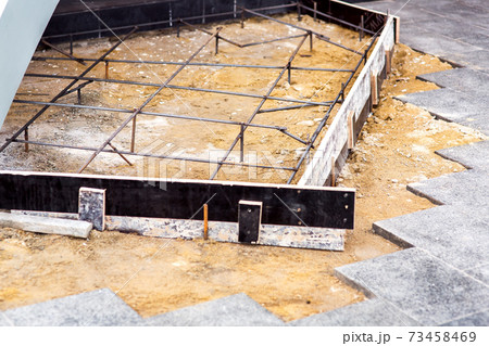 framework of reinforcement for pouring concrete steps, construction work using formwork for monolithic casting of concrete. framework of reinforcement for pouring concrete steps, construction work using formwork for monolithic casting of concrete. 73458469
