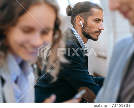 variety of passengers standing at the station subway. 73459388