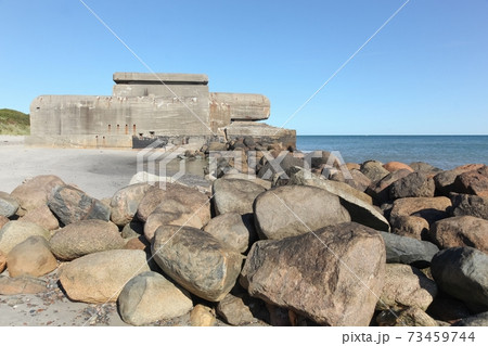 The beach in Skagen with an old bunker, Denmark The beach in Skagen with an old bunker, Denmark 73459744