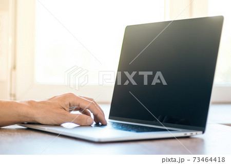 close up. male using a modern laptop. close up. male using a modern laptop. 73464418