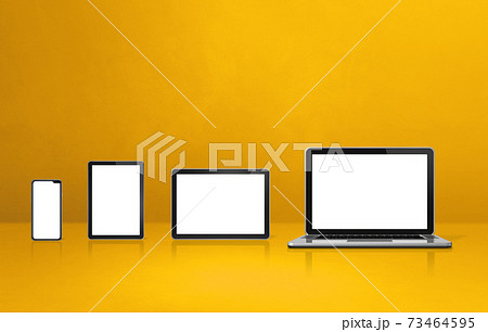 Laptop, mobile phone and digital tablet pc on yellow office desk Laptop, mobile phone and digital tablet pc on yellow office desk 73464595