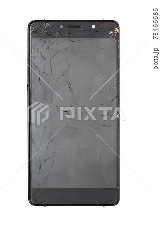Front view of a smartphone with a broken screen, a cellular phone with a faulty display in impact cracks, isolated on a white background. 73466686