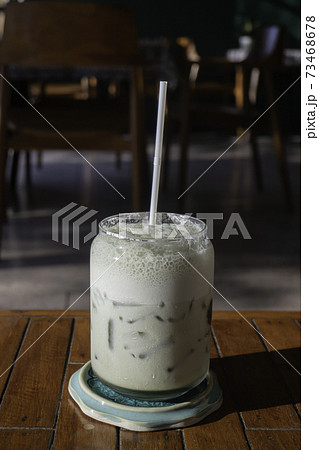 Iced green tea latte drink Iced green tea latte drink 73468678