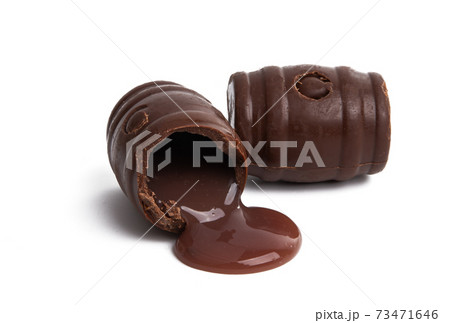 chocolate barrels with liquor isolated chocolate barrels with liquor isolated 73471646