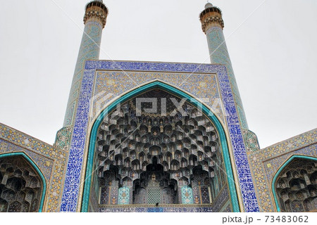 The exterior of Imam Mosque or The Shah Mosque. 17th Century. Unesco World Heritage Site. Low angle shot. The exterior of Imam Mosque or The Shah Mosque. 17th Century. Unesco World Heritage Site. Low angle shot. 73483062