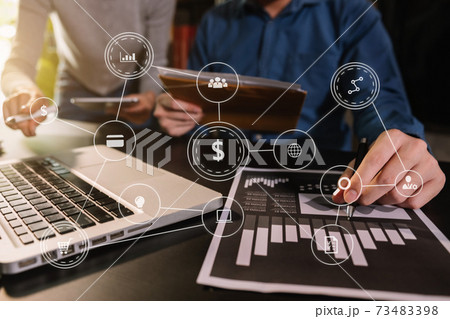 business using laptop and digital tablet with marketing virtual icon . business using laptop and digital tablet with marketing virtual icon . 73483398