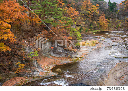 群馬県 紅葉に包まれた 吹割の滝 上流部の写真素材