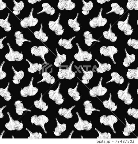 Garlic on a black background. Garlic pattern 73487502