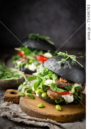 Veggie mushroom black burgers. Veggie mushroom black burgers. 73496763