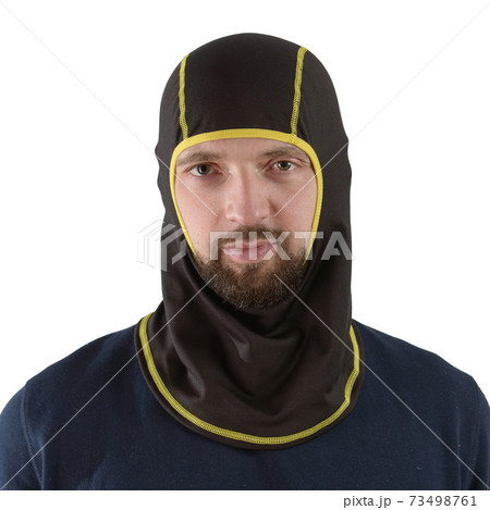 brunette man in a blue shirt with a black balaclava with yellow edging brunette man in a blue shirt with a black balaclava with yellow edging 73498761