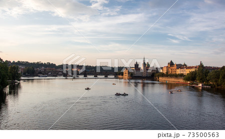 Charles bridge prague sunset light beautiful river water panoramic view Charles bridge prague sunset light beautiful river water panoramic view 73500563