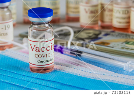 Medical vaccination vaccine vial dose prevention immunization on of medical syringe, injection Coronavirus COVID-19, protective surgical mask with phonendoscope 73502113