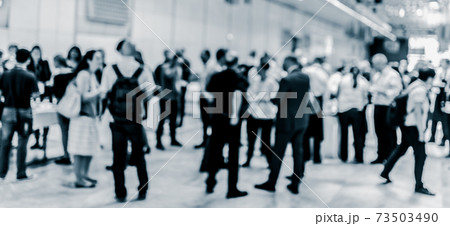 Blured image of businesspeople at coffee break at conference meeting. 73503490