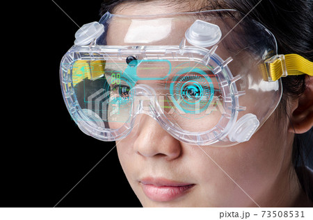 Female doctor examining while wearing VR headsets Innovative technologies in science and medicine. . 73508531