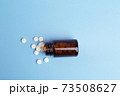Various medicine.White round drug and pill bottle 73508627