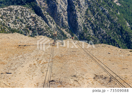 Cable car on ropeway leading to a top of Tahtali mountain in Antalya province, Turkey 73509088