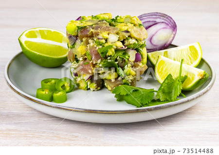 Seafood tuna fish ceviche salad avocado, lime, hot chili pepper, red onion, cilantro, sesame seeds 73514488