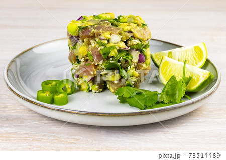 Seafood tuna fish ceviche salad avocado, lime, hot chili pepper, red onion, cilantro, sesame seeds 73514489